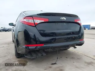 2012 Kia Optima Hybrid with VIN KNAGM4AD8C5021615, listed as a IAAI auction lot 41216697 with 119,153 mi miles. Bid and sale history available at carsss.com. Image 6.