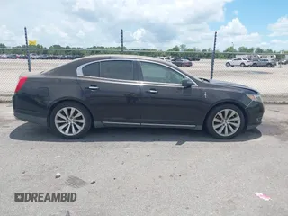 2014 Lincoln MKS with VIN 1LNHL9DK0EG605429, listed as a IAAI auction lot 42809745 with 127,038 mi miles and . Bid and sale history available at DreamBid. Image 13.