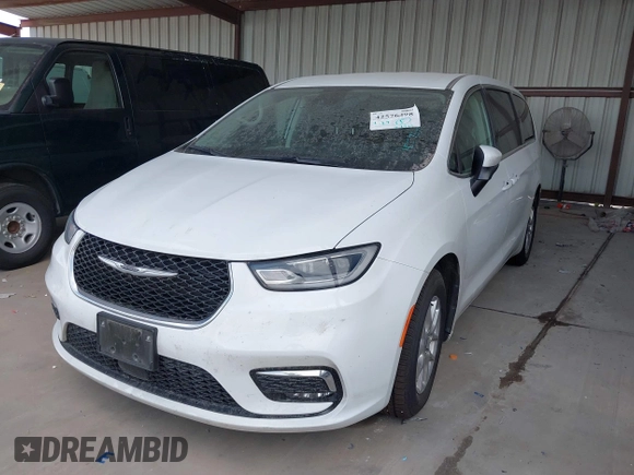 2023 Chrysler Pacifica Touring L with VIN 2C4RC1BG6PR550575, listed as a IAAI auction lot 42576498 with 54,373 mi miles and . Bid and sale history available at DreamBid. Image 22.