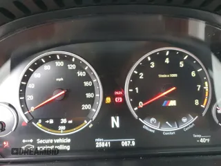 2015 BMW M6 z VIN WBS6C9C55FD467907, wystawiony jako Copart lot #72682374 z przebiegiem 25 841 mil mil oraz Szkoda całkowita • Salvage title. Historia ofert i sprzedaży dostępna na DreamBid. Obrazek 9.