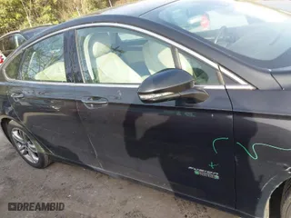 2015 Ford Fusion Energi Titanium with VIN 3FA6P0SU8FR189159, listed as a IAAI auction lot 41595744 with 170,558 mi miles. Bid and sale history available at carsss.com. Image 13.