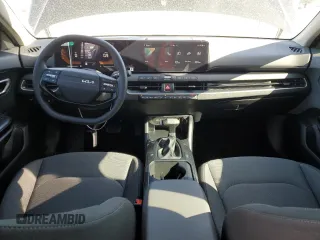 2025 Kia K4 LXS with VIN 3KPFT4DE2SE040332, listed as a Copart auction lot 49078615 with 8,977 mi miles and Salvage Title. Bid and sale history available at carsss.com. Image 8.