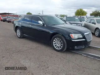 2013 Chrysler 300 with VIN 2C3CCAAG7DH573389, listed as a IAAI auction lot 41892941 with 138,839 mi miles. Bid and sale history available at carsss.com. Image 1.