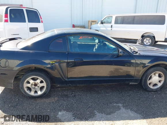 2004 Ford Mustang Standard with VIN 1FAFP40604F156534, listed as a IAAI auction lot 41794486 with 216,207 mi miles. Bid and sale history available at carsss.com. Image 14.