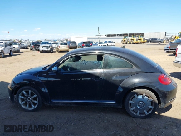 2013 Volkswagen Beetle 2.5L with VIN 3VWJP7ATXDM679115, listed as a IAAI auction lot 42212965 with Not Provided miles and . Bid and sale history available at DreamBid. Image 14.