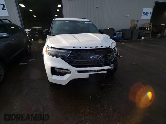 2022 Ford Explorer XLT with VIN 1FMSK8DH9NGC15548, listed as a Copart auction lot 77819694 with 23,087 mi miles and Salvage Title. Bid and sale history available at DreamBid. Image 14.
