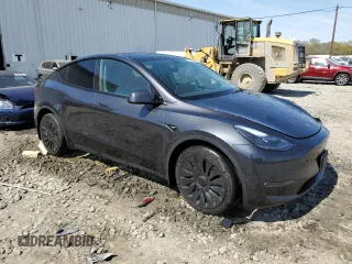 2024 Tesla Model Y Long Range with VIN 7SAYGDEE4RF990274, listed as a Copart auction lot 54239025 with 8,726 mi miles and Salvage title. Bid and sale history available at DreamBid. Image 4.