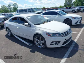 2014 Volkswagen CC R-Line z VIN WVWBP7AN7EE501064, wystawiony jako IAAI lot #42220870 z przebiegiem Nie podano mil oraz . Historia ofert i sprzedaży dostępna na DreamBid. Obrazek 1.