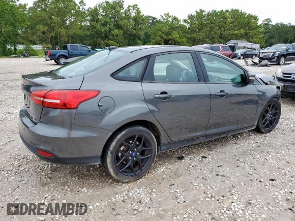 2016 Ford Focus SE with VIN 1FADP3F24GL407339, listed as a Copart auction lot 60744875 with 126,073 mi miles and Salvage title. Bid and sale history available at DreamBid. Image 3.