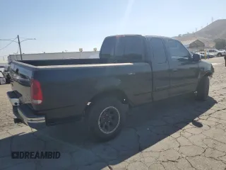 2000 Ford F-150 XL with VIN 1FTRX17W7YKB44552, listed as a Copart auction lot 72790504 with 0 mi miles and Salvage Title. Bid and sale history available at carsss.com. Image 3.