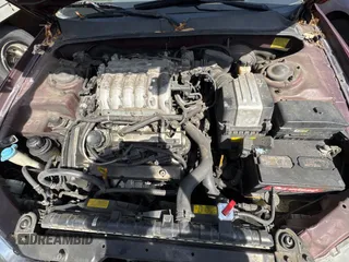 2005 Hyundai XG z VIN KMHFU45E95A381631, wystawiony jako Copart lot #57705005 z przebiegiem 202 730 mil mil oraz Tytuł czysty. Historia ofert i sprzedaży dostępna na DreamBid. Obrazek 7.