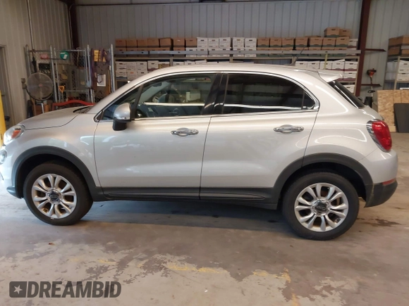 2016 FIAT 500X Lounge z VIN ZFBCFYDT0GP332060, wystawiony jako IAAI lot #42837184 z przebiegiem 159 804 mil mil oraz . Historia ofert i sprzedaży dostępna na DreamBid. Obrazek 14.