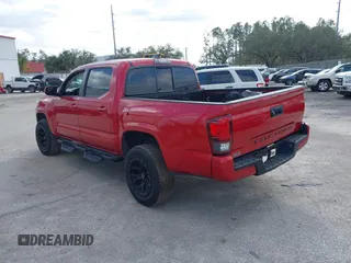 2022 Toyota Tacoma SR with VIN 3TYAX5GN1NT039848, listed as a IAAI auction lot 41210811 with 93,670 mi miles and . Bid and sale history available at DreamBid. Image 3.