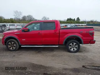 2011 Ford F-150 XLT with VIN 1FTFW1ET6BFD33921, listed as a IAAI auction lot 41821721 with 142,576 mi miles. Bid and sale history available at carsss.com. Image 14.