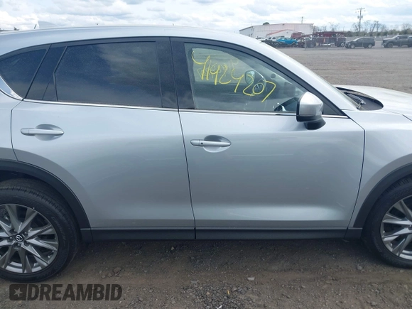 2021 Mazda CX-5 Grand Touring with VIN JM3KFBDM3M0354348, listed as a IAAI auction lot 41924207 with 45,786 mi miles. Bid and sale history available at carsss.com. Image 13.