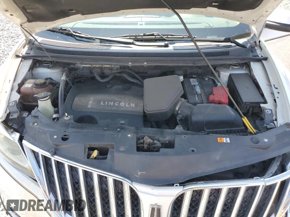 2011 Lincoln MKX z VIN 2LMDJ8JKXBBJ32276, wystawiony jako Copart lot #55921665 z przebiegiem 138 227 mil mil oraz Szkoda całkowita • Salvage title. Historia ofert i sprzedaży dostępna na DreamBid. Obrazek 11.