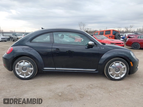 2013 Volkswagen Beetle 2.5L with VIN 3VWJP7AT8DM679548, listed as a IAAI auction lot 41459613 with 135,198 mi miles and . Bid and sale history available at DreamBid. Image 13.