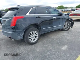 2018 Cadillac XT5 FWD z VIN 1GYKNARS3JZ137039, wystawiony jako IAAI lot #41667581 z przebiegiem 98 281 mil mil oraz . Historia ofert i sprzedaży dostępna na DreamBid. Obrazek 4.