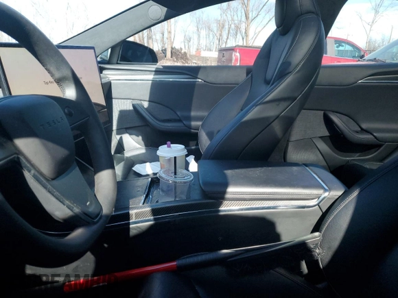 2023 Tesla Model S Plaid с VIN 5YJSA1E69PF515714, выставлен на аукционе Copart как лот 45212665 с пробегом Не указан миль и Списание • Salvage title. История ставок и продаж доступна на DreamBid. Изображение 7.