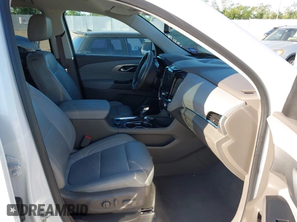 2021 Chevrolet Traverse LT z VIN 1GNERHKWXMJ163645, wystawiony jako IAAI lot #41949887 z przebiegiem 89 448 mil mil oraz . Historia ofert i sprzedaży dostępna na DreamBid. Obrazek 5.
