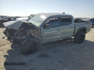 2022 Toyota Tacoma SR with VIN 3TMCZ5AN6NM514918, listed as a Copart auction lot 62371075 with 35,428 mi miles and Salvage title. Bid and sale history available at DreamBid. Image 1.