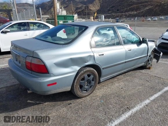 1996 Honda Accord LX with VIN 1HGCD5634TA291036, listed as a IAAI auction lot 41583543 with 166,725 mi miles and . Bid and sale history available at carsss.com. Image 4.