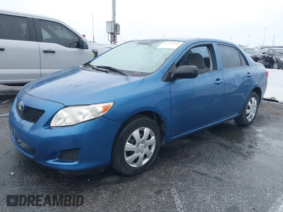 2009 Toyota Corolla with VIN JTDBL40E999052447, listed as a IAAI auction lot 41914900 with 133,676 mi miles. Bid and sale history available at carsss.com. Image 2.