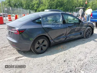 2023 Tesla Model 3 with VIN 5YJ3E1EA2PF566047, listed as a IAAI auction lot 42481008 with 21,143 mi miles and . Bid and sale history available at DreamBid. Image 4.