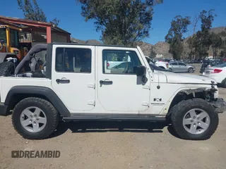 2007 Jeep Wrangler Unlimited X with VIN 1J4GB39147L133997, listed as a IAAI auction lot 41676009 with 110,849 mi miles and . Bid and sale history available at DreamBid. Image 13.