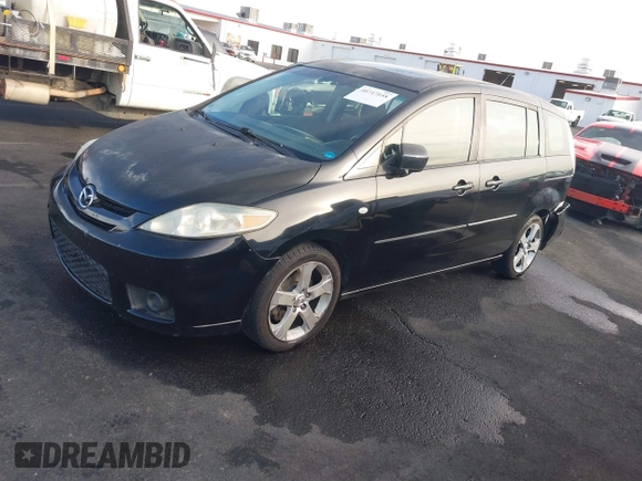 2007 Mazda 5 Touring with VIN JM1CR293570151745, listed as a IAAI auction lot 40747058 with 158,796 mi miles and . Bid and sale history available at DreamBid. Image 2.