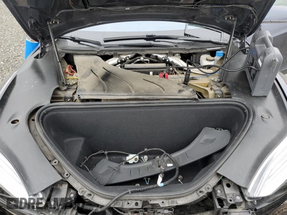 2019 Tesla Model S 75D z VIN 5YJSA1E23KF312145, wystawiony jako Copart lot #57344975 z przebiegiem 33 092 mil mil oraz Szkoda całkowita • Salvage title. Historia ofert i sprzedaży dostępna na DreamBid. Obrazek 11.