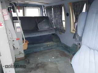 1996 Ford Econoline Cargo with VIN 1FDEE14N7THA03059, listed as a IAAI auction lot 41217045 with 139,435 mi miles and . Bid and sale history available at DreamBid. Image 8.
