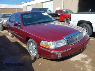 2004 Mercury Grand Marquis LS Premium z VIN 2MEFM75W24X609858, wystawiony jako IAAI lot #41574999 z przebiegiem 84 853 mil mil oraz . Historia ofert i sprzedaży dostępna na DreamBid. Obrazek 1.