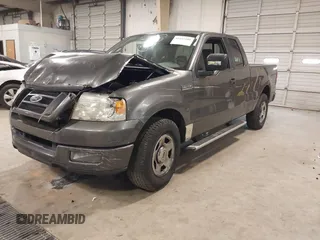 2005 Ford F-150 STX with VIN 1FTRX12W95NB38107, listed as a IAAI auction lot 41185100 with 201,171 mi miles. Bid and sale history available at carsss.com. Image 2.