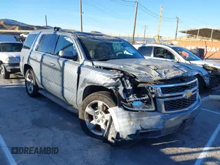 2016 Chevrolet Tahoe LS with VIN 1GNSCAKC0GR413515, listed as a IAAI auction lot 41249760 with 163,107 mi miles and . Bid and sale history available at DreamBid. Image 1.