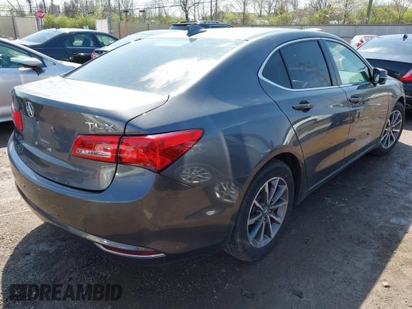 2020 Acura TLX w/Technology Pkg with VIN 19UUB1F52LA012185, listed as a IAAI auction lot 41942957 with 14,677 mi miles. Bid and sale history available at carsss.com. Image 4.