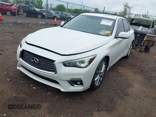 2018 Infiniti Q50 Luxe z VIN JN1EV7AR3JM445195, wystawiony jako IAAI lot #42228587 z przebiegiem 122 575 mil mil oraz . Historia ofert i sprzedaży dostępna na DreamBid. Obrazek 2.