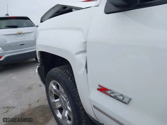 2015 Chevrolet Silverado 1500 LT with VIN 1GCVKREC7FZ421032, listed as a IAAI auction lot 41520494 with 184,880 mi miles. Bid and sale history available at carsss.com. Image 6.