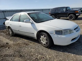 1999 Honda Accord LX с VIN 1HGCG5649XA022830, выставлен на аукционе Copart как лот 52702215 с пробегом Не указан миль и Списание • Salvage title. История ставок и продаж доступна на DreamBid. Изображение 4.
