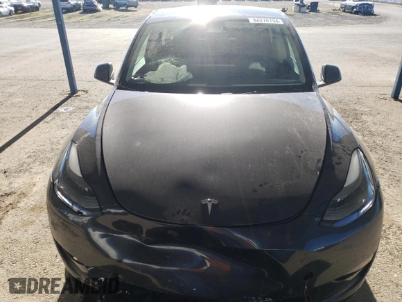 2024 Tesla Model Y Long Range with VIN 7SAYGDEE4RF127409, listed as a Copart auction lot 84274794 with 14,246 mi miles and Salvage title. Bid and sale history available at DreamBid. Image 5.