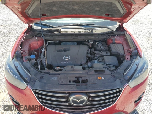 2016 Mazda CX-5 Grand Touring z VIN JM3KE2DYXG0840777, wystawiony jako Copart lot #49700585 z przebiegiem 116 469 mil mil oraz Szkoda całkowita • Salvage title. Historia ofert i sprzedaży dostępna na DreamBid. Obrazek 12.