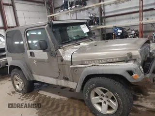 2005 Jeep Wrangler Rubicon with VIN 1J4FA69S65P311732, listed as a IAAI auction lot 41442147 with 174,277 mi miles. Bid and sale history available at carsss.com. Image 13.