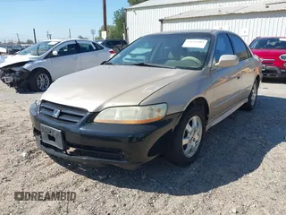 2001 Honda Accord EX z VIN JHMCG66801C014214, wystawiony jako IAAI lot #41643404 z przebiegiem 139 020 mil mil oraz . Historia ofert i sprzedaży dostępna na DreamBid. Obrazek 2.