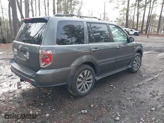 2007 Honda Pilot EX-L with VIN 5FNYF28707B042212, listed as a IAAI auction lot 41478485 with 182,849 mi miles. Bid and sale history available at carsss.com. Image 4.