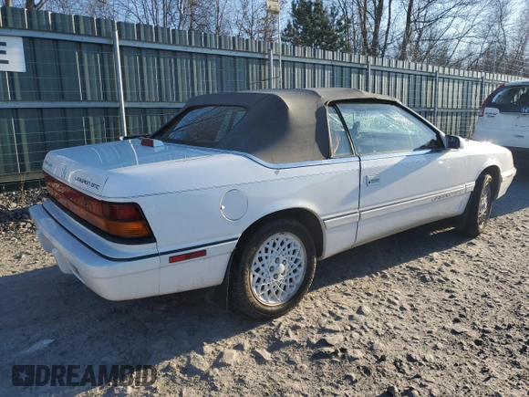 1993 Chrysler LeBaron z VIN 1C3XU4534PF654847, wystawiony jako Copart lot #84391684 z przebiegiem 129 520 mil mil oraz Szkoda całkowita • Salvage title. Historia ofert i sprzedaży dostępna na DreamBid. Obrazek 3.