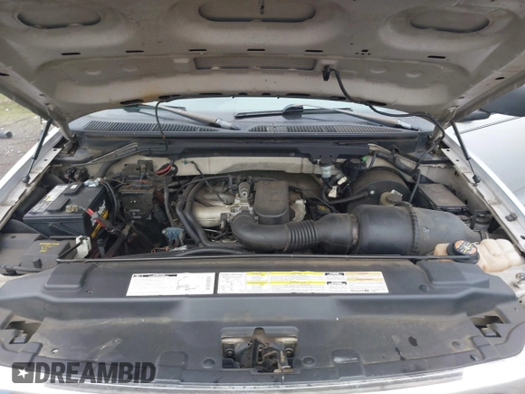 1999 Ford F-150 with VIN 2FTZF1828XCA85643, listed as a IAAI auction lot 41347113 with 173,813 mi miles and . Bid and sale history available at DreamBid. Image 10.