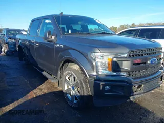 2019 Ford F-150 XL with VIN 1FTEW1E55KFD39996, listed as a IAAI auction lot 41327273 with 28,220 mi miles. Bid and sale history available at carsss.com. Image 6.