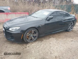 2014 BMW M6 z VIN WBSLX9C58ED160558, wystawiony jako IAAI lot #41553209 z przebiegiem 154 789 mil mil oraz . Historia ofert i sprzedaży dostępna na DreamBid. Obrazek 2.