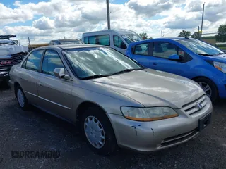 2001 Honda Accord LX with VIN 1HGCG66501A005789, listed as a IAAI auction lot 42217613 with 135,801 mi miles and . Bid and sale history available at DreamBid. Image 6.