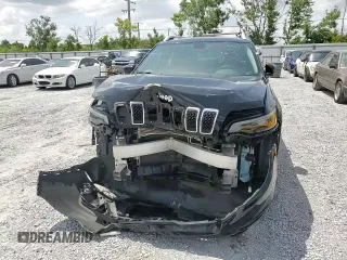 2019 Jeep Cherokee Latitude Plus z VIN 1C4PJMLB4KD162564, wystawiony jako Copart lot #60292615 z przebiegiem 61 167 mil mil oraz Szkoda całkowita • Salvage title. Historia ofert i sprzedaży dostępna na DreamBid. Obrazek 14.